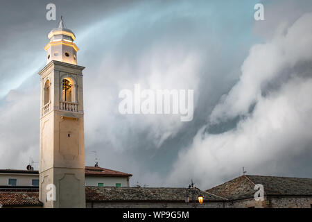 Storm brewing above a village in Italy Stock Photo