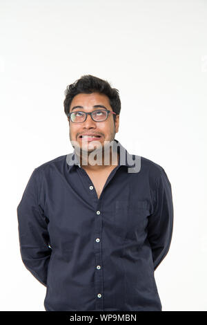 Young man looking irritated Stock Photo