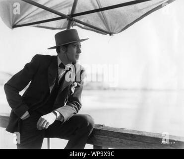 GARY COOPER as The Llano Kid Portrait by BREDELL in THE TEXAN 1930 director John Cromwell from O. Henry story Paramount Pictures Stock Photo