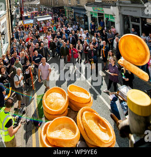 Competitors throw black puddings to knock down Yorkshire puddings during the annual World Black Pudding Throwing Championships in Ramsbottom, Lancashire. PA Photo. Picture date: Sunday September 8, 2019. Local legends claim the tradition dates back to the War of the Roses. Warring factions of the House of Lancaster and the House of York are said to have run out of ammunition and resorted to throwing food at each other at a battle in Stubbins, Lancashire in 1455. See PA story SOCIAL BlackPudding. Photo credit should read: Peter Powell/PA Wire Stock Photo