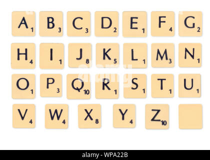 Digitally created image of a full alphabet of scrabble tiles on white background Stock Photo