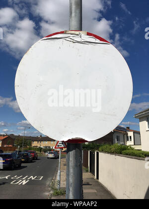 Newly fitted 20 mph / twenty miles per hour signs remain concealed prior to the new borough wide 20 mph speed limit coming into force in Richmond upon thames, London. The plastic film cover just needs to be removed to reveal the number 20 and the red circle encloses it. This sign is in Twickenham which is within the borough of Richmond upon Thames. UK. Stock Photo