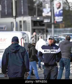 LONDON, ENGLAND - March  19 : A fan arrives at the stadium prior to the FA Cup  Quarter Final match between Millwall and Brighton at The Den. Stock Photo