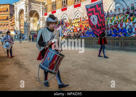 A drummer in the historic parade that takes place before the Palio horse race, Piazza del Campo, Siena, Italy Stock Photo