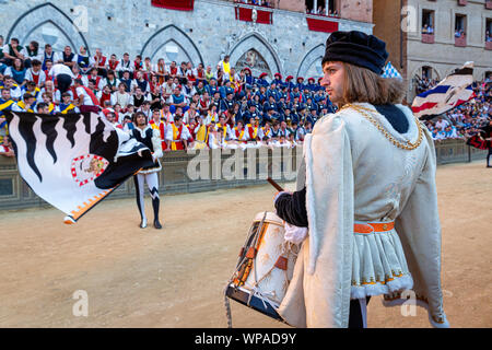 A drummer in the historic parade that takes place before the Palio horse race, Piazza del Campo, Siena, Italy Stock Photo