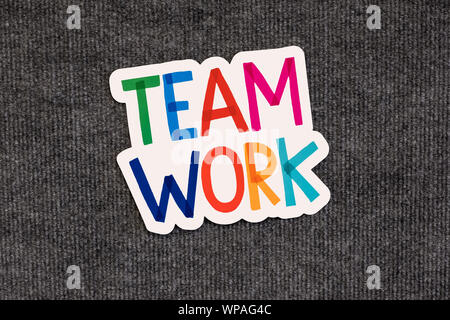 Team work words on blackboard with colorful alphabets. Stock Photo