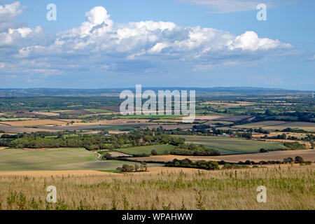 View of farming landscape in summer near Charleston& West Firle towards Lewes from the South Downs Way in East Sussex, England UK  KATHY DEWITT Stock Photo