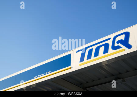 TinQ sign at gas station. TinQ is a subsidiary of Gulf Oil and is the market leader in the Dutch market with over 300 unmanned filling stations. Stock Photo