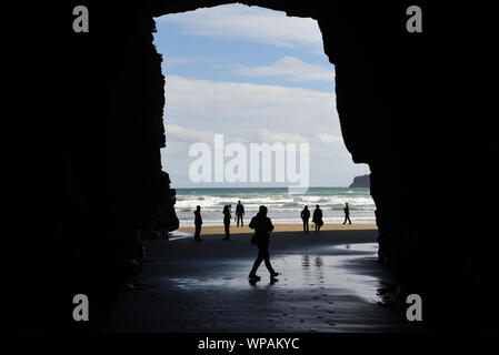 The remote, Maori owned, Cathedral Caves on the South island of New Zealand are only accessible during a short period at very low tide. Stock Photo