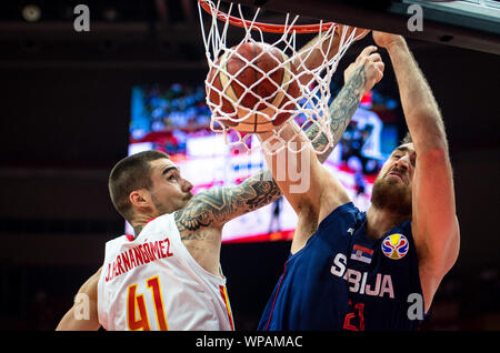 Wuhan, China's Hubei Province. 8th Sep, 2019. Nikola Milutinov (R) of Serbia dunks against Juancho Hernangomez of Spain during the group J match between Spain and Serbia at the 2019 FIBA World Cup in Wuhan, capital of central China's Hubei Province, Sept. 8, 2019. Credit: Xiao Yijiu/Xinhua/Alamy Live News Stock Photo