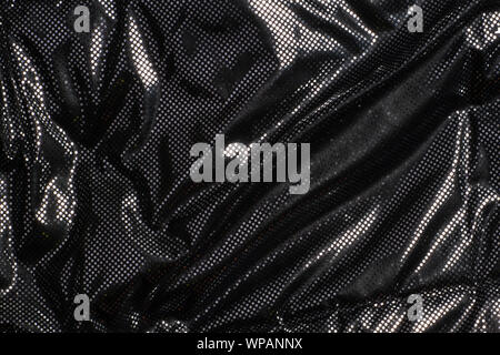 Gray black metalic silver polka dot fabric texture background Stock Photo