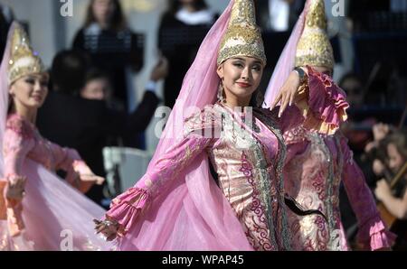 Moscow, Russia. 07 September, 2019. Russian dancers perform during the cultural show celebrating Moscow City Day at VDNKh Exhibition Centre September 7, 2019 in Moscow, Russia.   Credit: Aleksey Nikolskyi/Kremlin Pool/Alamy Live News Stock Photo