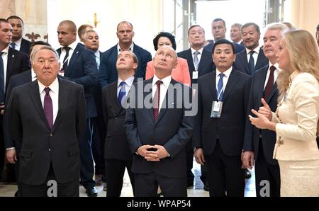 Moscow, Russia. 07 September, 2019. Russian President Vladimir Putin, center, joins Kazakh President Nursultan Nazarbayev, left, Russian Prime Minister Dmitry Medvedev, center left, and Moscow Mayor Sergei Sobyanin, right, during a visit to the renovated Kazakhstan pavilion at VDNKh Exhibition Centre September 7, 2019 in Moscow, Russia.   Credit: Aleksey Nikolskyi/Kremlin Pool/Alamy Live News Stock Photo