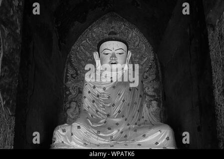 BAGAN, MYANMAR - 06 DECEMBER, 2018: Black and white picture of beautiful Buddha statue located inside the Ananda Temple in Bagan, Myanmar Stock Photo