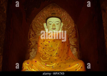 BAGAN, MYANMAR - 06 DECEMBER, 2018: Horizontal picture of beautiful Buddha statue located inside the Ananda Temple in Bagan, Myanmar Stock Photo