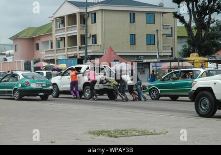 Helping act on african street. Stock Photo