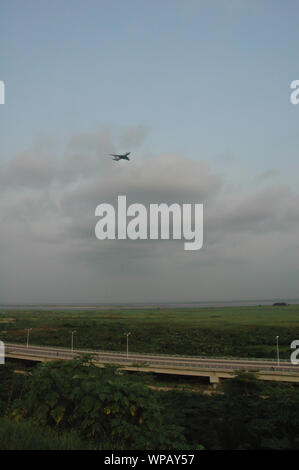 Airplane over highway to Brazzaville in Congo. Stock Photo