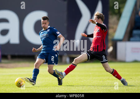Dundee, Scotland, UK. 8th September 2019; Dens Park, Dundee, Scotland; Scottish Challenge Cup, Dundee Football Club versus Elgin City; Cammy Kerr of Dundee and Kane Hester of Elgin City - Editorial Use Only. Credit: Action Plus Sports Images/Alamy Live News Stock Photo