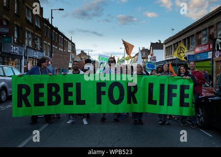 Harringay, London, UK. 8th Sep, 2019. Extinction Rebellion stage a protest march down Green Lanes in North London. The march started at Turnpike Lane and finished at Manor House (c) Credit: Paul Swinney/Alamy Live News Stock Photo