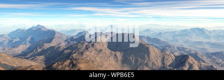 Panorama spectacular aerial view of mountains. Misty awaking of beautiful fairy valley. Peaks of rocks cut creamy foggy clouds. Stock Photo