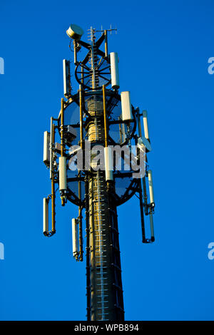 Detail of a 3G, 4G LTE transmitter tower against clear blue sky Stock Photo