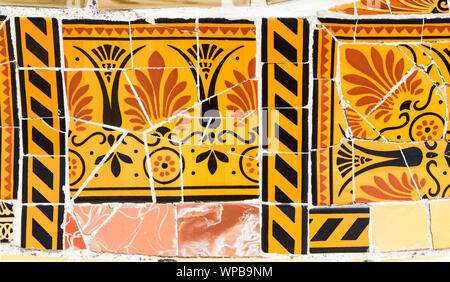 Decorative ceramic tiles in Park Guell designed by Antonio Gaudi Stock Photo