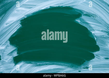 Green smudged chalkboard texture close up Stock Photo