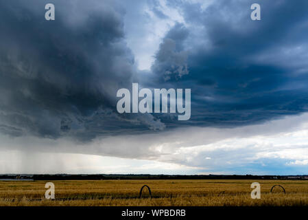 storms clouds rolling on a prairie landscape in Medicine Hat, Alberta, Canada Stock Photo