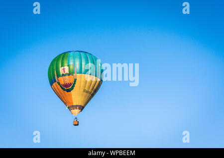 Kiev, Ukraine – August 19, 2019: air balloon fly in the sky over the city in sunny day Stock Photo