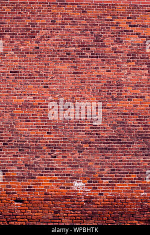 Red vintage bricks wall background. Old building surface Stock Photo