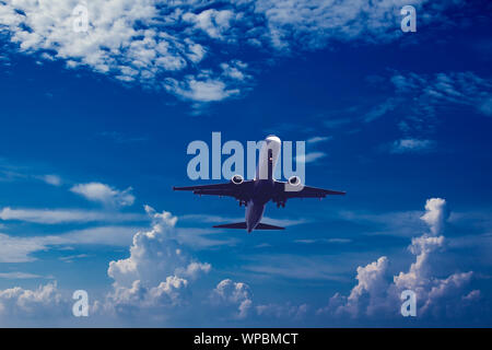 Plane in the sky. Holiday and travel concept Stock Photo