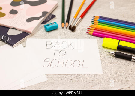 Back to school - School supplies on the desk Stock Photo