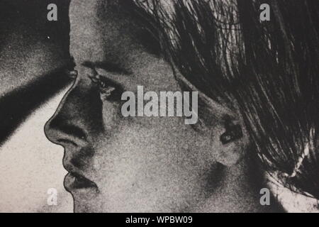 Fine black and white art photography from the 1970 of a woman waiting and watching. Stock Photo