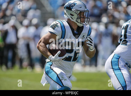 Carolina Panthers running back Christian McCaffrey (22) stands on the  sidelines as Carolina plays the Los Angeles Rams in the second half of an  NFL football game in Charlotte, North Carolina on