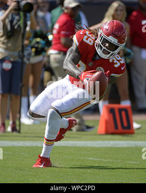 TREMON SMITH (1)(R) upends JU-JU SMITH SCHUSTER (9)(L) during the game  between the Kansas City Chiefs and the Houston Texans in Houston, Texas at  NRG Stadium on December 18, 2022. The Kansas