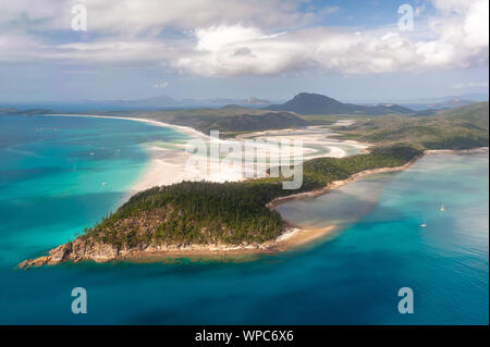 Aerial shot of Hill Inlet over Whitsunday Island - swirling white sands, sail boats and blue green water make spectacular patterns