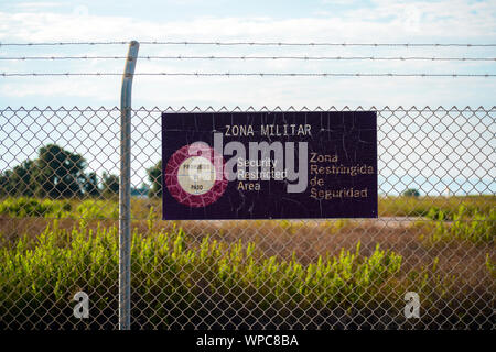 Military zone of restricted access in Spain. Private area. Warning sign to no trespassing. Prohibition in the airport of San Javier, Spain, 2019. Stock Photo