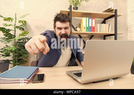 Business confrontation. Bad news. Failed again. Mission failed. It is your fault. So cruel. Brutal businessman in office. Mature man with beard. bearded hipster use computer. Male boss working. Stock Photo