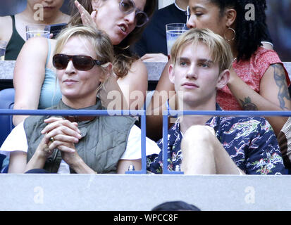 Flushing Meadow, New York, USA. 08th Sep, 2019. Uma Thurman and son Levon Roan Thurman-Hawke watch the Men’s Final in Arthur Ashe Stadium at the 2019 US Open Tennis Championships at the USTA Billie Jean King National Tennis Center on Sunday, September 8, 2019 in New York City.      Photo by John Angelillo/UPI Credit: UPI/Alamy Live News Stock Photo