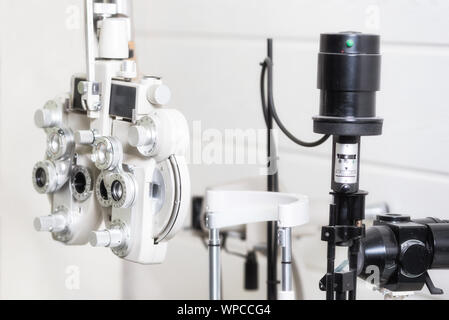 Phoropter, ophthalmic testing device machine in Ophthalmology clinic . Stock Photo