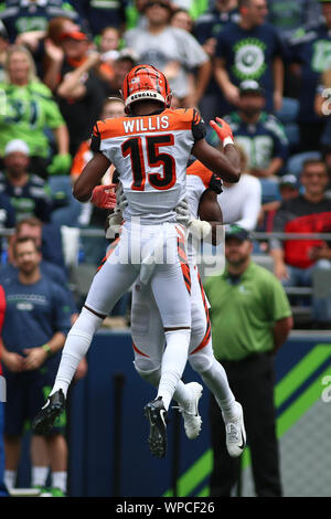 Cincinnati Bengals wide receiver Damion Willis (15) is brought down by  Seattle Seahawks cornerback Shaquill Griffin (26) after catching a 7-yard  pass during the fourth quarter at CenturyLink Field on September 8