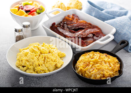 Full breakfast with scrambled eggs, bacon and potatoes Stock Photo