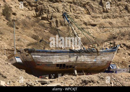 An old boat on land in the town of Belfast, Maine Stock 