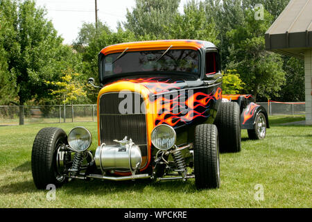 During a custom hot rod & antique car show this vehicle was one of the many on display that the people were able to see and ask owners' any questions. Stock Photo