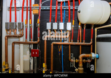 Main boiler piping, independent heating system of house heating system pipes collector of underfloor heating system Stock Photo