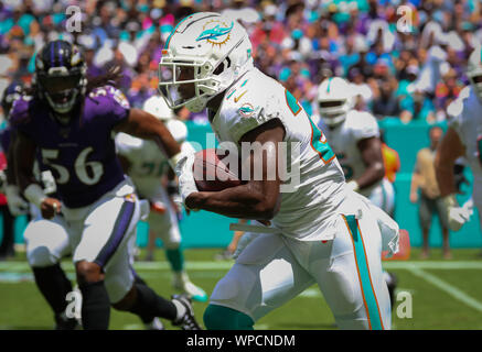 Miami Gardens, Florida, USA. 8th Sep, 2019. Miami Dolphins running back Kalen Ballage (27) runs with the ball during an NFL football game against the Baltimore Ravens at the Hard Rock Stadium in Miami Gardens, Florida. Credit: Mario Houben/ZUMA Wire/Alamy Live News Stock Photo