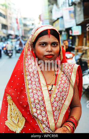 [Image: portrait-of-an-indian-woman-wearing-a-co...wpcr9r.jpg]
