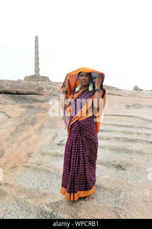 An Indian woman wearing a traditional Saree in Hampi, Karnataka. Stock Photo