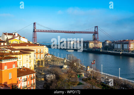 Vizcaya Bridge is a transporter bridge that links the towns of Portugalete and Las Arenas (Getxo) the Nervion River, Basque Country, Spain Stock Photo