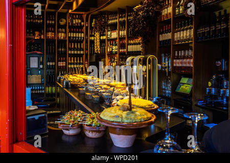 Traditional Basque food know as pintxos (Spanish tapas) showed in a bar in Bilbao, Basque Country, Spain Stock Photo